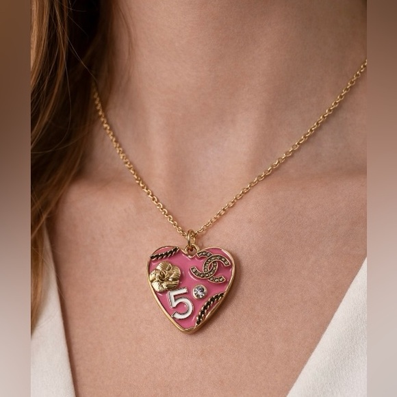 Jewelry - Chanel stamped Gold and Hot Pink Heart Pendant/charm/zipper pull